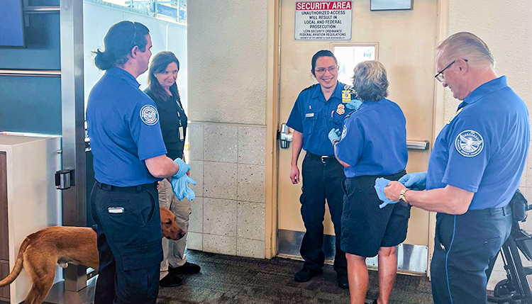 TSA Officers Dariusz Burow, Israel Almanza, Rebecca Fitzgerald, Canine Handler Leslie Runnels, and Canine Officer Rusty. (Photo courtesy of TSA RSW)