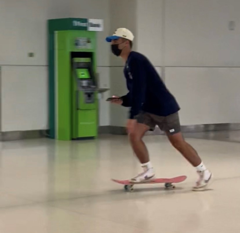 Individual skateboarding through San Juan's Airport