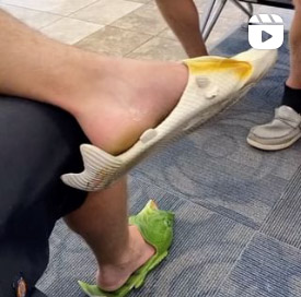 Fish flops on a passenger's feet