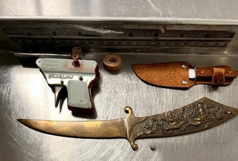 A cap gun, large letter opener and small knife discovered in an Appleton Airport passenger's carry-on bag.