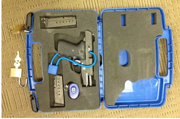 A properly packed firearm sits in a hard-sided case and is locked. This case must then be taken to the check-in counter for the airline to transport it in the belly of the plane. (TSA photo)