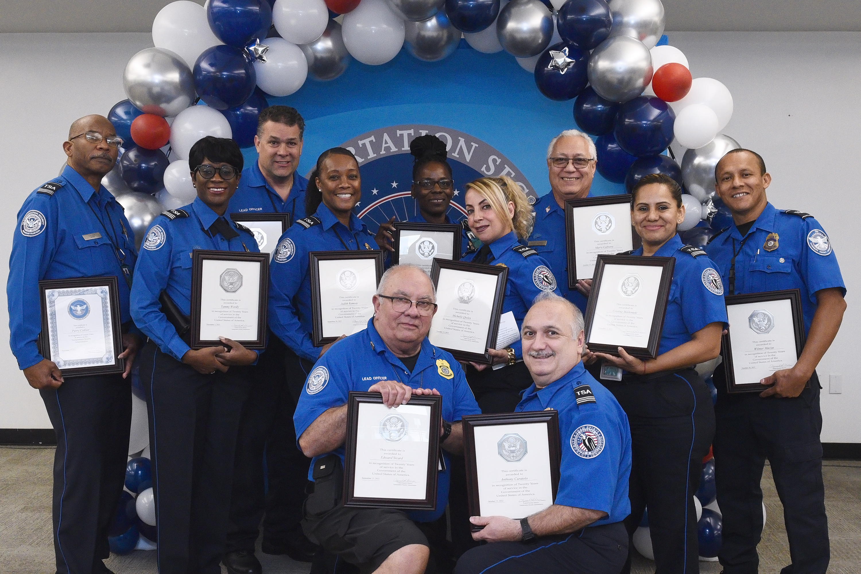These Miami International Airport TSA officers were honored for completing 20 years of service with the agency. (Photo by TSA MIA media team)