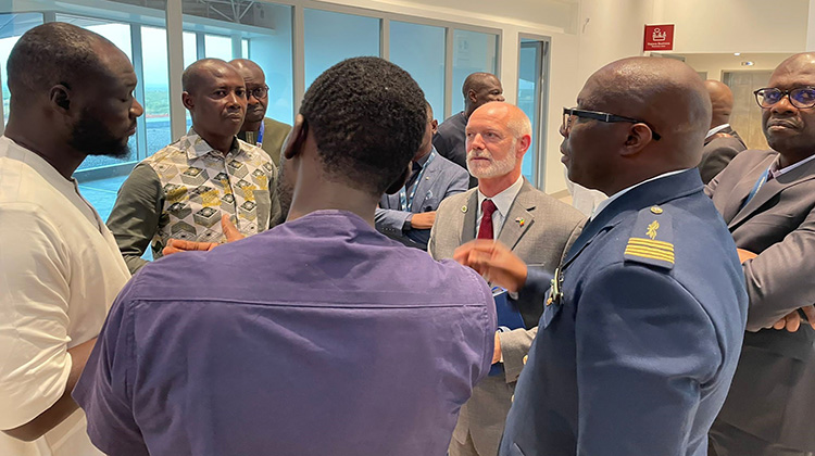 TSA International Operations Assistant Administrator Gary Renfrow (center) meets with members of the High Airport Authority of Senegal at the train station at Blaise Diagne International Airport. (Photo by Lori Silcox)