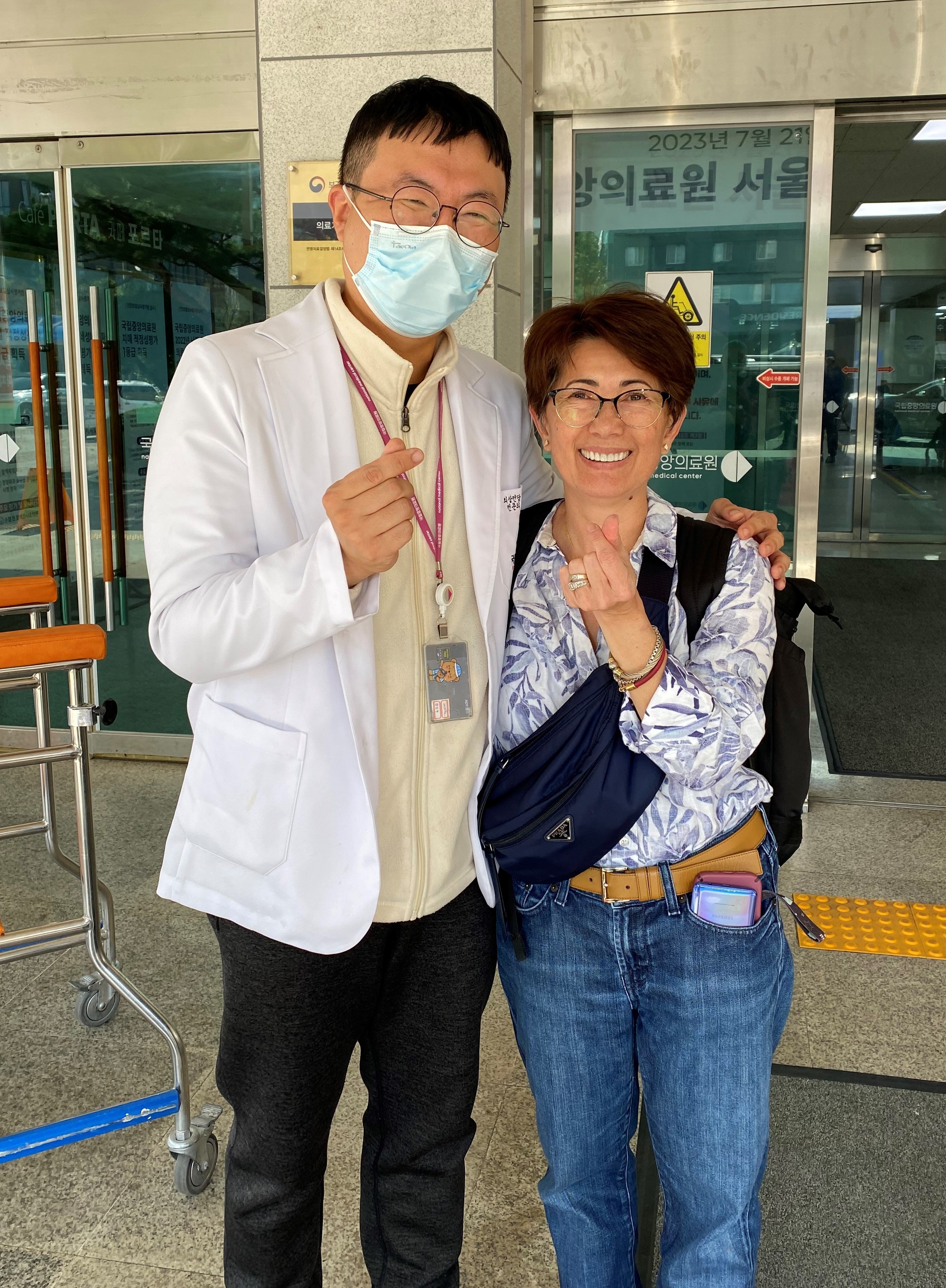 Frances Zapanta with Gilbert’s doctor in South Korea. (Photo by Diane Wilson)