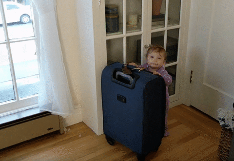 kid with luggage