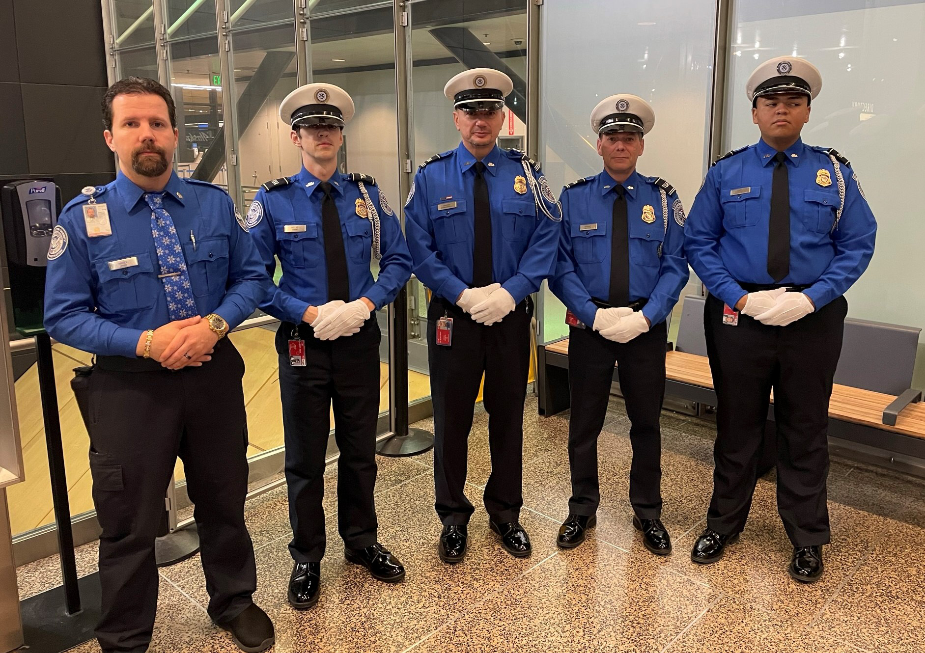 Members of TSA’s Honor Guard at Seattle-Tacoma International Airport. From left, TSA Officers Destry Hoover and Cody Mielke, Supervisory Officer Krzyzstof Zimonski, Lead Officer Joe Germany, Officer Wesley Carter. (Photo by BrookHunter Whelchel)