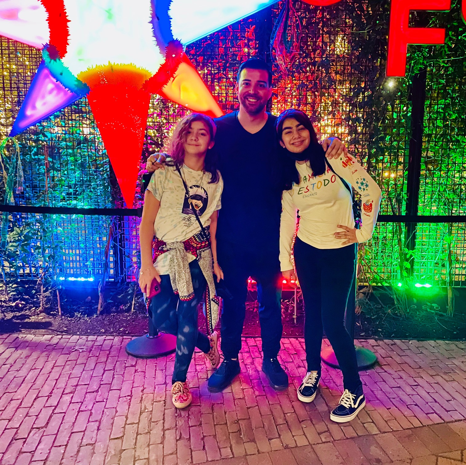 Enrollment Services and Vetting Programs Program Analyst Raul Diaz and his daughters, Alexia and Andrea, in San Antonio’s Pearl District, which features a wide array of restaurants, breweries, galleries and shops. (Photo courtesy of Raul Diaz)