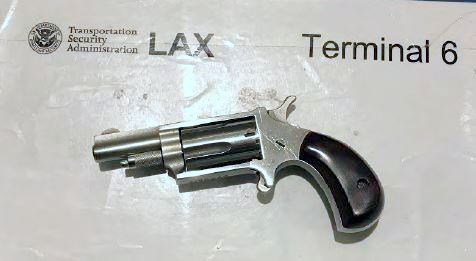 An AIT anomaly detected in the buttocks area revealed a loaded .22 caliber pistol on a Los Angeles (LAX) traveler.