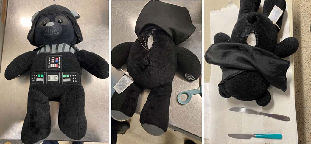 A stuffed animal that was stuffed with two knives. TSA officers removed these two knives from the back of the stuffed animal at a security checkpoint at Philadelphia International Airport. (TSA photos)