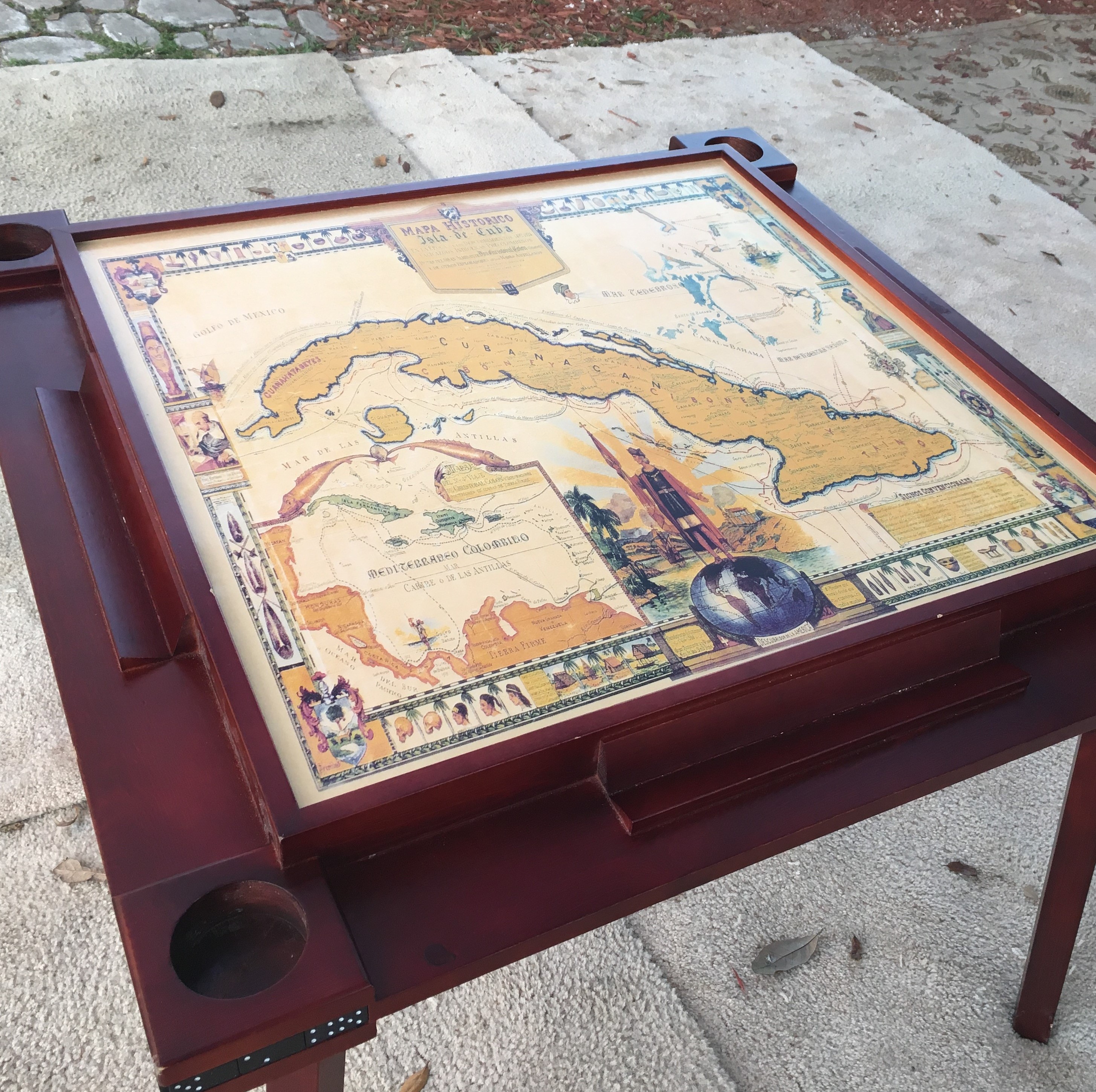  A custom-made domino table owned by Heiddy Rocha’s parents honors their homeland and one of their favorite pastimes. (Photo courtesy of Heiddy Rocha)