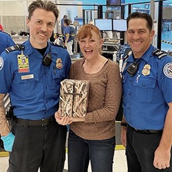 Southwest Florida International Airport (RSW) TSA Officer Andrew Whitehair and Lead TSA Officer Ryan Bacidore assist passenger and her father’s remains to his final destination. (Picture courtesy TSA RSW)
