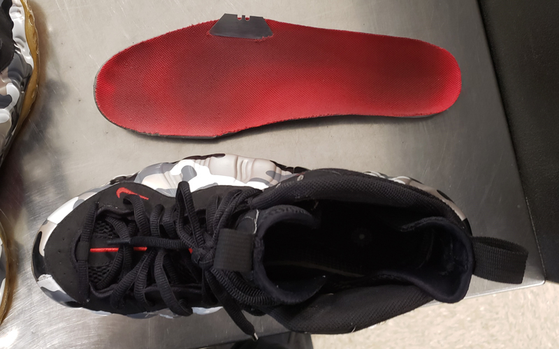 Razor blade concealed inside a shoe