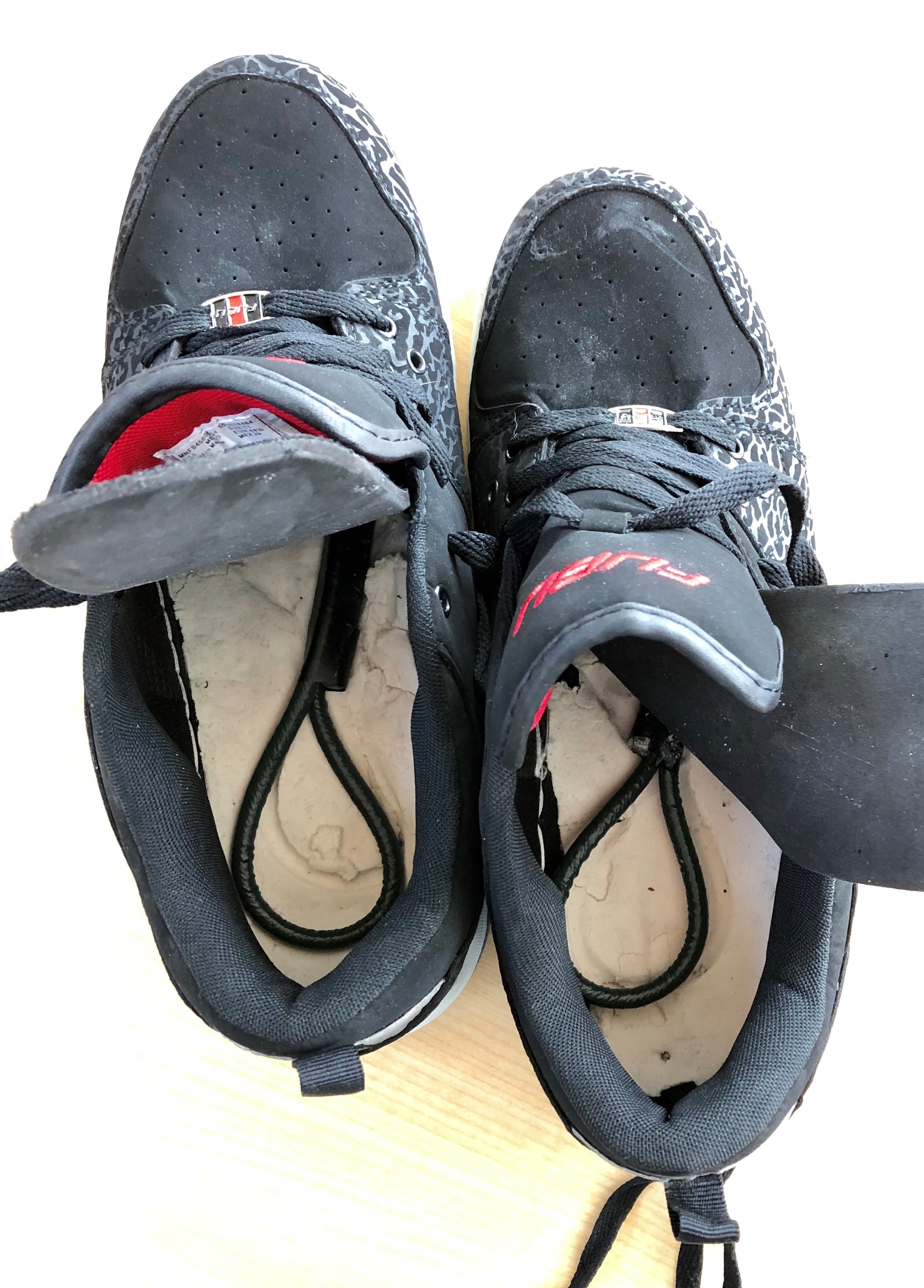 This is a pair of shoes with explosives concealed inside. They are used as training aids for TSA officers at Burlington International Airport. TSA requires travelers remove their shoes to ensure that there is nothing concealed inside. (TSA photo)