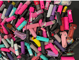 A pile of pepper spray canisters that have been detected at BWI Airport security checkpoints. (TSA photo).