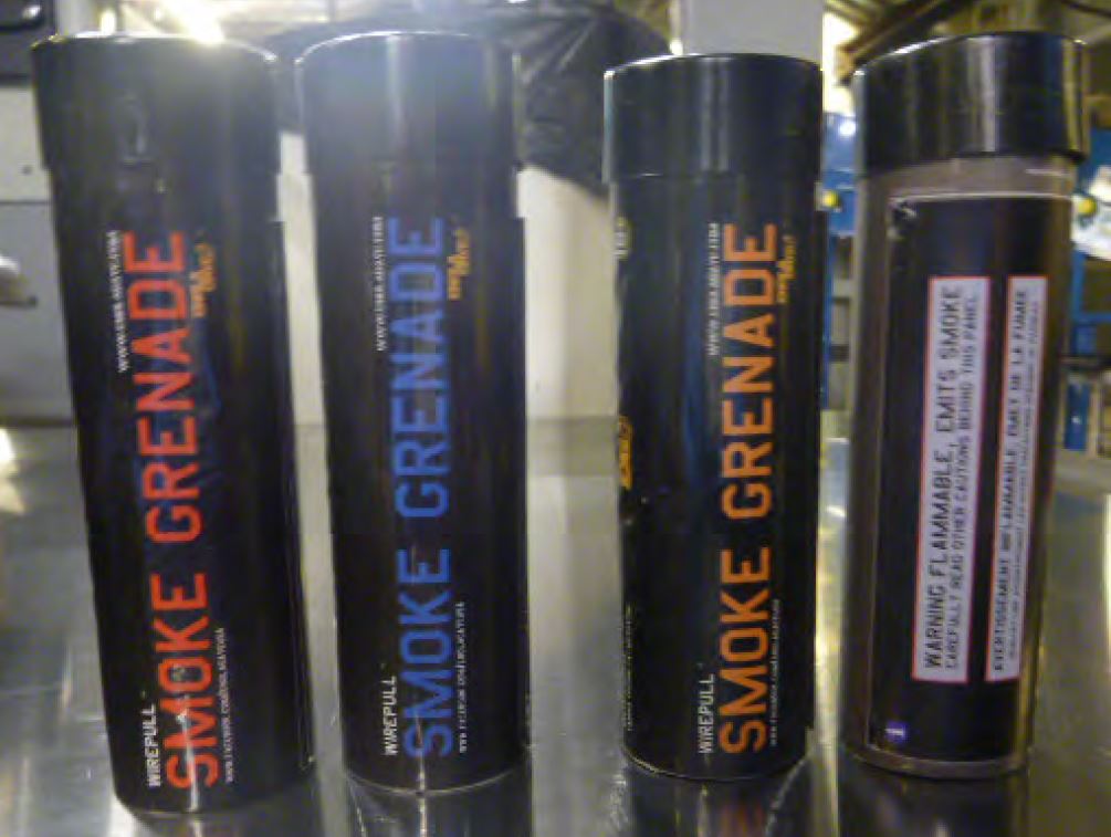 These four smoke grenades were discovered in a checked bag at Dallas Love Filed (DAL). 