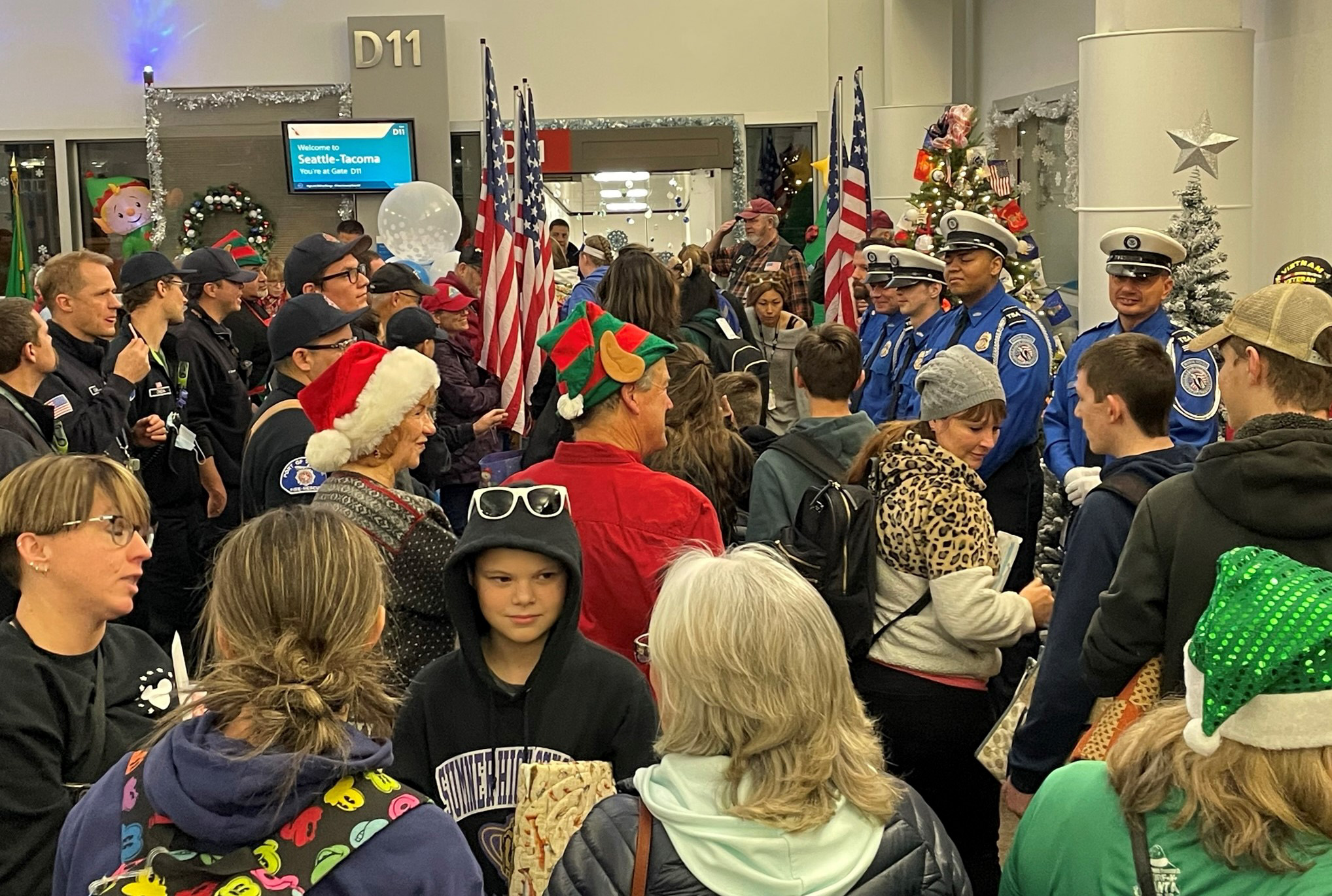 TSA team members honor Gold Star families by supporting a Snowball Express holiday celebration at Seattle-Tacoma International Airport. (Photo by BrookHunter Whelchel)