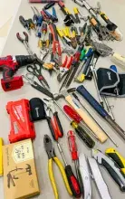 Tools left by passengers were later boxed for TSA to hand over to representatives