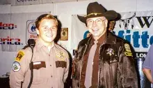 From left, Explorer Scout Robert Spinden and Sheriff Jim Spinden in 1997. “The program was a great introduction into law enforcement for kids,” said Robert. (Photo courtesy of the Spinden Family)
