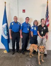 From left, TSA Officers Dariusz Burow, Israel Almanza, Rebecca Fitzgerald, Canine Handler Leslie Runnels, and Canine Officer Rusty. (Photo courtesy of TSA RSW)