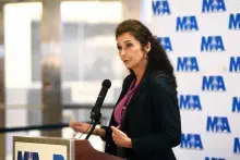 Jenel Chang speaking during a Miami International Airport (MIA) press conference. (Photo courtesy of Jenel Chang)