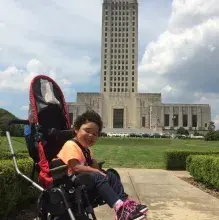Kaci Billings in front of the Louisiana State Capitol, where a bill to increase resources and information about shaken baby syndrome was named in her honor. (Photo by Michael Billings)