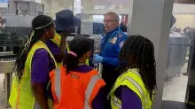 Baltimore/Washington International Thurgood Marshall Airport (BWI) Lead TSA Officer Thomas Stein gives some Baltimore students an up close look at TSA’s screening operation at BWI. (TSA BWI photo) 