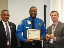 Former Supervisory TSA Officer Raymond Alston was recognized by Newark Liberty International Airport Federal Security Director Donald Drummer, retired (left) and Deputy Federal Security Director (current Newark FSD) Tom Carter for his support as lead behavior detection officer during the 2014 Super Bowl. (Photo courtesy of Raymond Alston)
