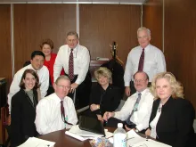 Senior leaders at the time of the agency’s inception. Seated from left, Ashley Cannatti, Ralph Basham, Gale Rossides, Stephen McHale and Lana Tannozzini. Standing from left, Tony Woo, Francine Kerner, John Magaw and Kevin Houlihan. (Photo courtesy of TSA Historian)