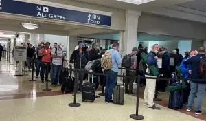 CUTLINE: Golf fans flood Augusta Regional Airport the day after the Masters. (Photo by Cora Gauthreaux)