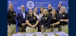 TSA with Louisiana Reentry Program managers including Baton Rouge, New Orleans, New Iberia, Lake Charles, and Lafayette at the TSA booth. Front row, from left, Jeri Mestayer, Hester Serrano, Heather Pennington, Melissa Young. Back row, from left, Kyle Pitre, Scott Peyton, Kaitlin Daly, Julean Thorpe, Steven Lassalle, James Solieau. (Photo courtesy of TSA ESVP)