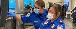 Nashville International Airport Supervisory TSA Officer Loretta Brown (left) and TSA Officer Stefanie Certeza examine an X-ray image.  (Photo by Judith Kolanda)