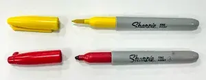 A Sharpie turned into a shiv with a full-length spike of fiberglass and a sharp tip was caught at the checkpoint by Huntsville International Airport TSA Officers Germaine Galarza and Michael Lombardo. Below is a regular Sharpie marker. (Photo courtesy of TSA Huntsville)