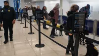 Guide dogs and their trainers go through TSA PreCheck® screening. (TSA DCA photo)