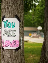 A hand-lettered sign posted on the Essex Pride Festival grounds spreads a simple, yet profound message of love. The Essex Pride Festival, in Essex, Vermont, entertained the community with dozens of performers and artists.  (Photo courtesy of Kris M.)