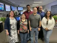 Here are six of Phoenix Sky Harbor International Airport’s Coordination Center officers. Front row from left, Susan Bauer, Emily Price, Joseph Gastelum, Alexia Camacho. Back row from left, Orlando Villa, Brad Sterling. (Photo by Patricia Mancha)