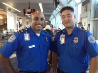 TSA officers are on hand to offer guidance to travelers as they pass through the checkpoint. (TSA photo)