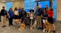 Southwest Florida International Airport Canine Supervisor Wyatt Rhoden (left) with Southwest Airlines representatives and Golden PAWS members at a familiarization training. (Photo courtesy of Wyatt Rhoden)