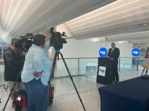 Minnesota FSD Marty Robinson speaks to media about the proper way to fly with a firearm. (TSA photo)