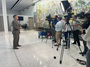 Indiana Federal Security Director Aaron Batt speaks to the media about new checkpoint technology at IND. (TSA Photo)