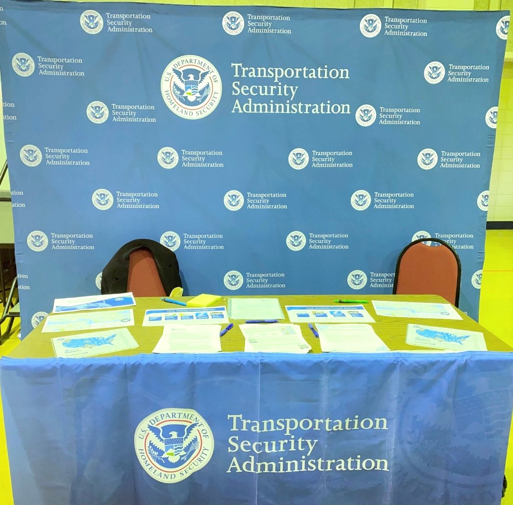 TSA booth with materials on the TWIC and HME enrollment and redress process. (Photo courtesy of TSA ESVP)