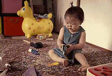 Child with wallet GIF